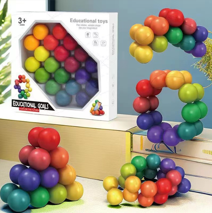 Juguete sensorial de esferas arcoiris